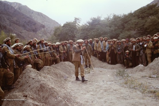 Massoud pauses as he begins a lecture that will last more than two hours, giving each group of mujahideen specific assignments.